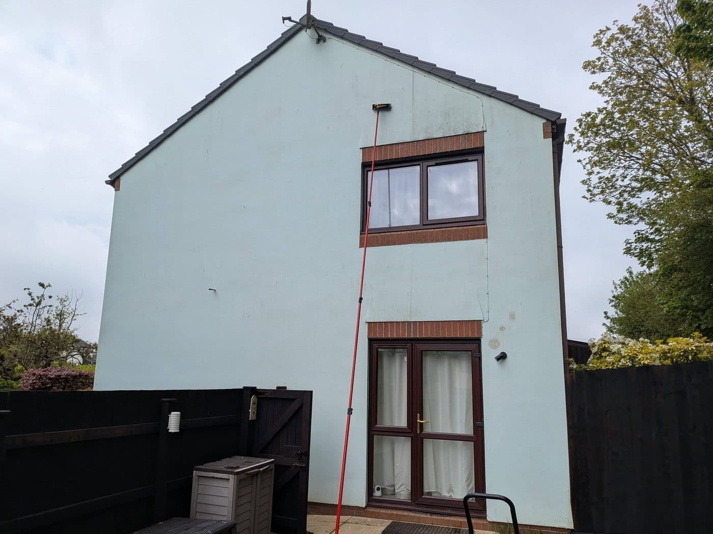 Front-door glass clean — UPVC frame restored